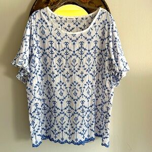 Lightweight women’s embroidered cotton shirt; Gently worn. Flounce sleeve.